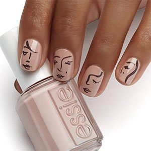 Las uñas abstractas con caras versión picassiana nos encantan. Reproduce la de la imagen gracias a los esmaltes Spin the bottle y Licorice de essie.